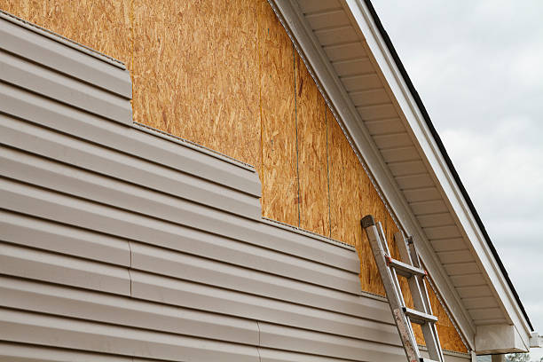 Professional Siding Repair technician working in Wenham, MA
